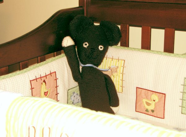 Teddy in the crib