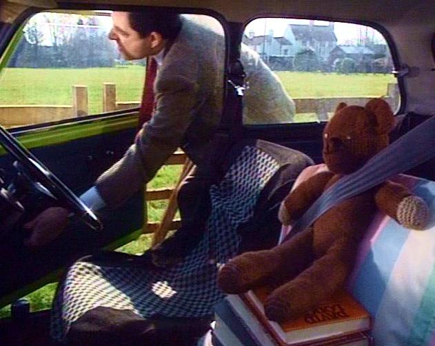 Teddy and Mr. Bean in the car